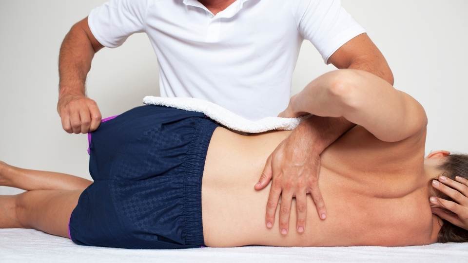 woman getting physiotherapy for rib pain Dublin Physio & Chiropractic