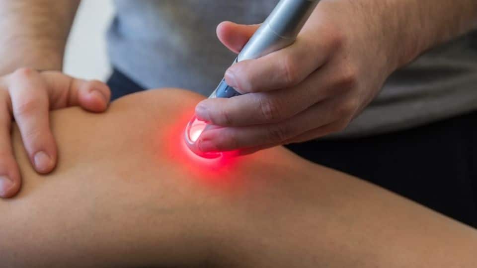woman getting laser therapy for baker's cyst