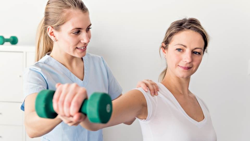 woman getting physio for a humeral fracture