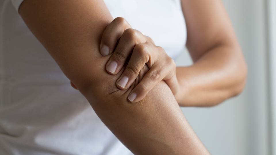 woman with cubital tunnel syndrome