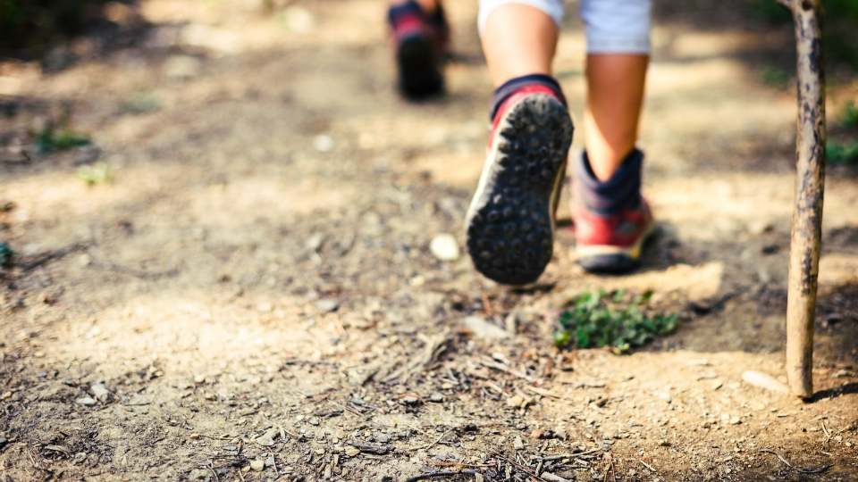 woman freely hiking pain free